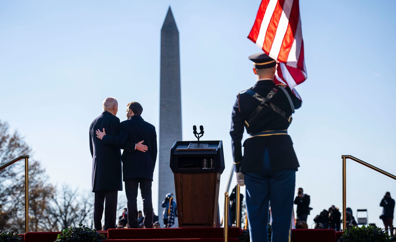 US President Joe Biden, left, and French President Emmanuel Macron stand for their national anthems during Macron's official arrival ceremony in Washington, DC, on Thursday, December 1. Biden is hosting Macron <a href="https://www.cnn.com/2022/12/01/politics/biden-macron-state-visit" target="_blank">for a state visit this week</a>. It's the first state visit during Biden's administration.