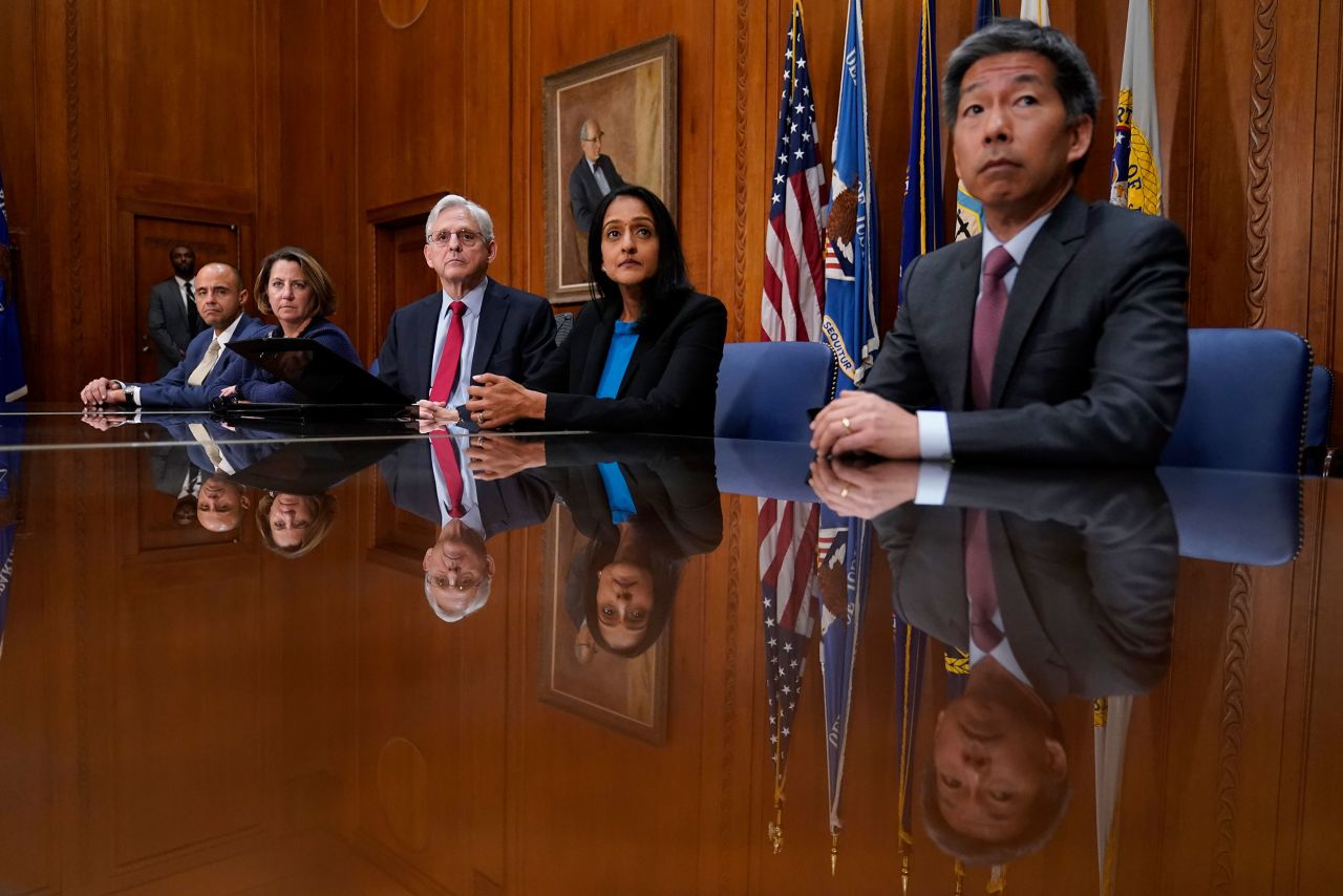 US Attorney General Merrick Garland, center, listens to a question during a news conference at the Justice Department in Washington, DC, on Wednesday, November 30. The Justice Department <a href="https://www.cnn.com/2022/11/30/politics/merrick-garland-news-conference/index.html" target="_blank">is seeking access to "all" transcripts and other evidence collected</a> in the House's investigation of <a href="http://www.cnn.com/2022/01/03/politics/gallery/january-6-capitol-insurrection/index.html" target="_blank">last year's attack on the US Capitol</a>, Garland said in response to a question from CNN's Evan Perez. During this news conference, Garland also put the spotlight on several other cases brought by the department — including new litigation related to the Jackson, Mississippi, water crisis — that he said encapsulated the department's commitment to the rule of law, public safety and the protection of civil rights.