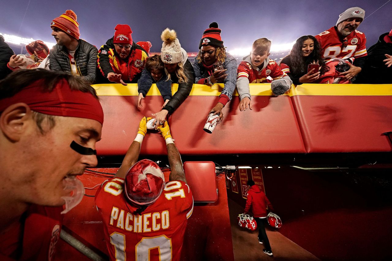 Kansas City running back Isiah Pacheco signs autographs after an NFL football game in Kansas City, Missouri, on Sunday, November 27. 