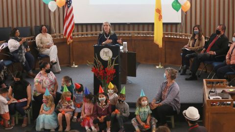 Gov. Michelle Lujan Grisham announces a 2021 increase in childcare grants in Santa Fe, New Mexico.