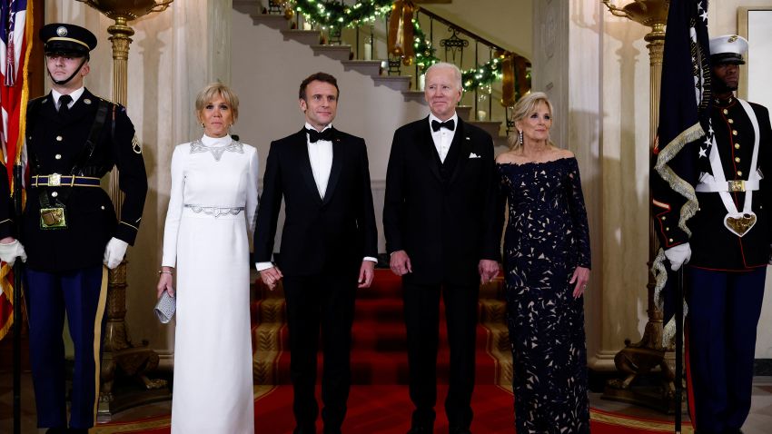 U.S. President Joe Biden, U.S. first lady Jill Biden, France's President Emmanuel Macron and his wife Brigitte Macron pose for a picture at the Grand Staircase of the White House on the occasion of the State Dinner, in Washington, U.S., December 1, 2022. REUTERS/Evelyn Hockstein