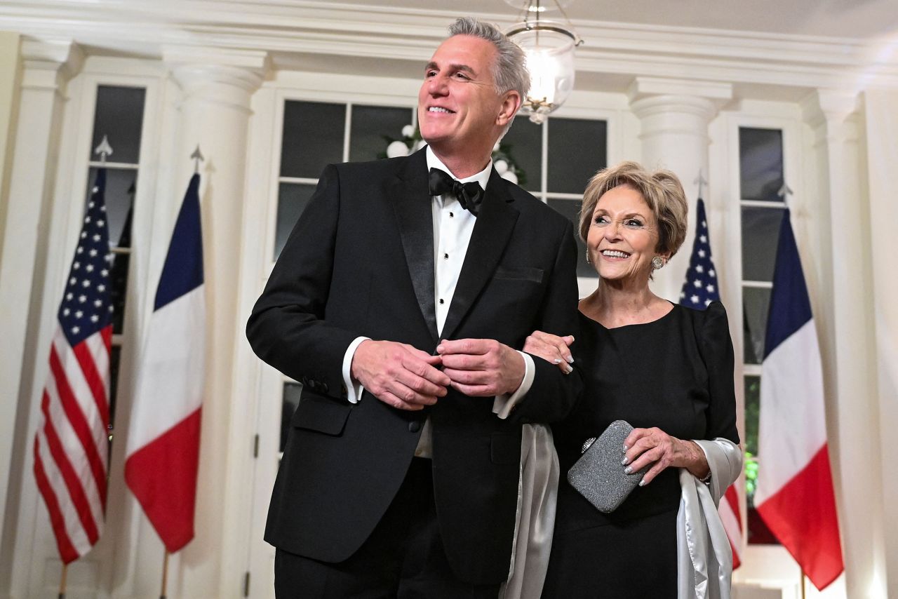 House Minority Leader Kevin McCarthy and his mother, Roberta, pause as they enter.  