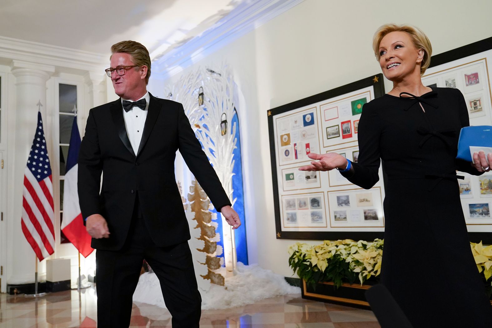 Television hosts Joe Scarborough and Mika Brzezinski talk with the press as they arrive. 