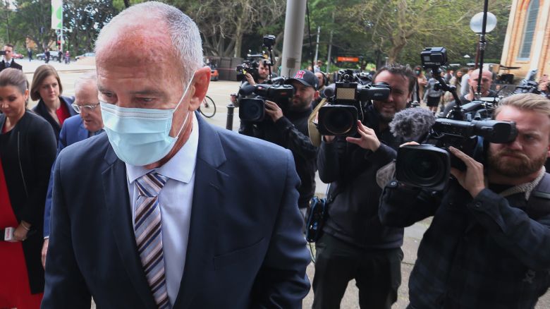 Chris Dawson and team arrive at NSW Supreme Court on August 30, 2022 in Sydney, Australia. Dawson, a former Newtown Jets rugby league player, is accused of murdering his wife Lynette and disposing of her body in January 1982.