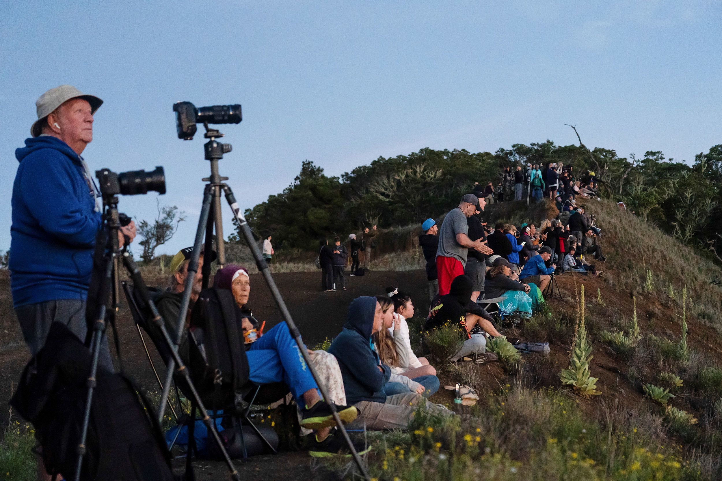 People gather to observe the eruption.