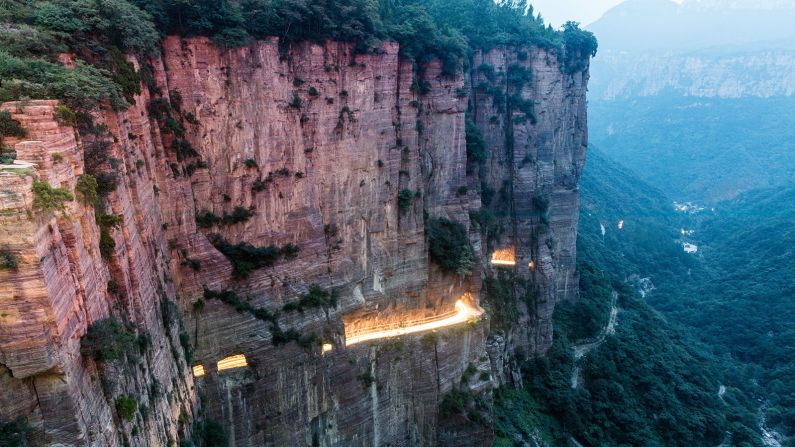 <strong>Guoliang Tunnel, China:</strong> Cut into the vertiginous cliff faces of the Taihang Mountains, this tunnel was originally built by locals to make Guoliang village more accessible. Today it's a top tourist destination.<br />