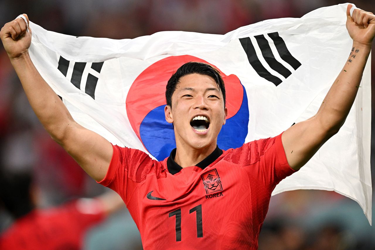South Korea's Hwang Hee-chan celebrates Friday after his team's 2-1 victory over Portugal clinched a spot in the next round. Hwang scored the game-winning goal in second-half stoppage time.