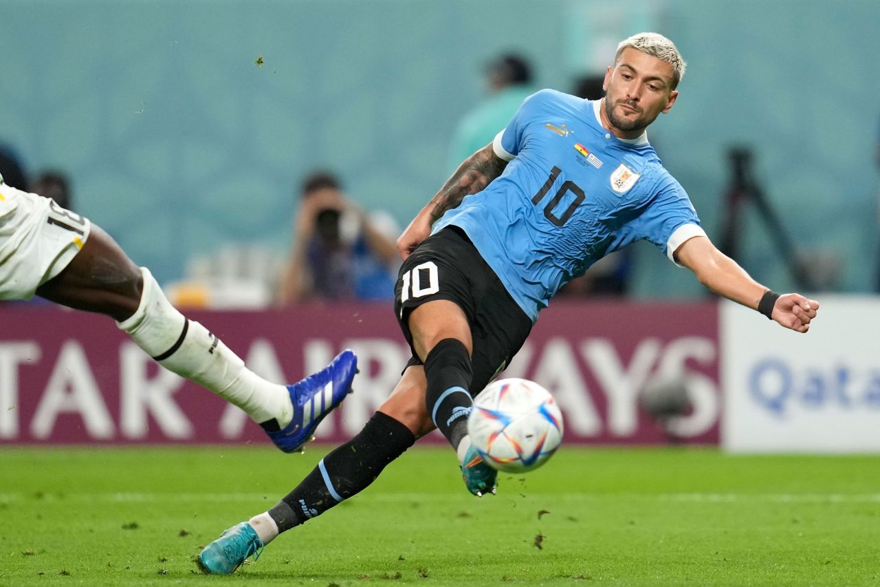 Uruguay's Giorgian de Arrascaeta scores his second goal in the 2-0 victory over Ghana on Friday. Uruguay finished Group H with the same amount of points as South Korea, but the South Koreans advanced because they scored more goals in the group.