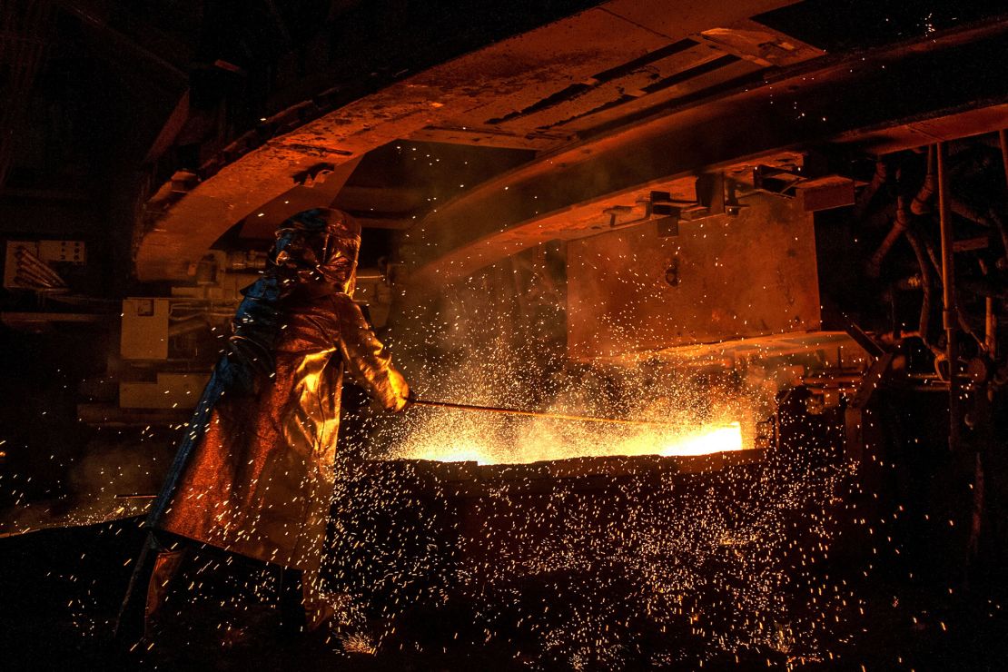 A worker mans a furnace during the nickel smelting process at mining company PT Vale's plant in South Sulawesi, Indonesia.
