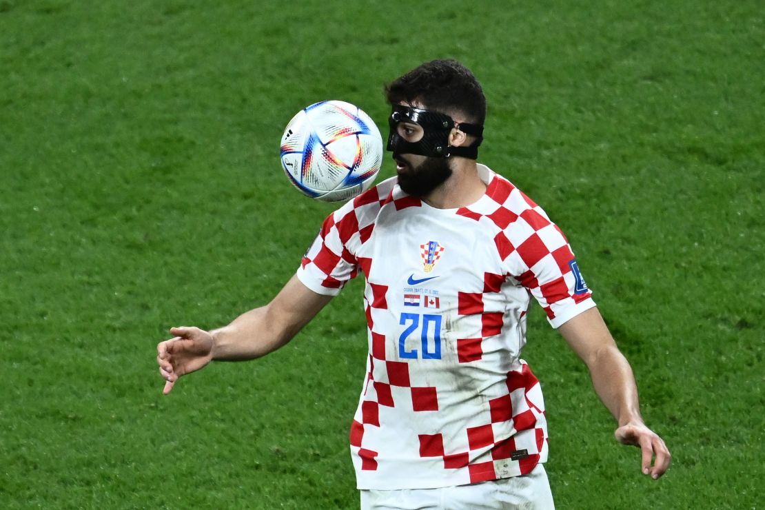 Gvardiol looks at the ball during Croatia's game against Canada at the 2022 World Cup.