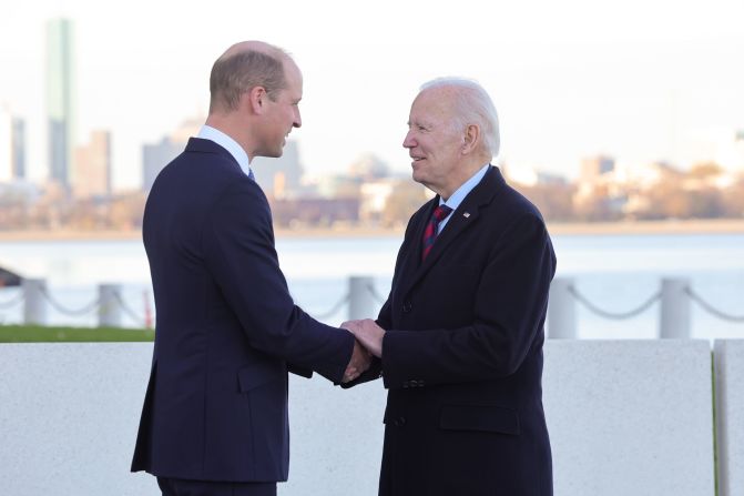 Britain's Prince William shakes hands with US President Joe Biden in Boston on Friday. The two men <a href="index.php?page=&url=https%3A%2F%2Fwww.cnn.com%2F2022%2F12%2F02%2Fpolitics%2Fbiden-prince-william-boston%2Findex.html" target="_blank">shared "warm memories" of William's grandmother</a>, the late Queen Elizabeth II, according to Kensington Palace.