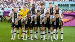 German national team with hands in front of their mouths in protest prior to the FIFA World Cup Qatar 2022 Group E match between Germany and Japan at Khalifa International Stadium on November 23, 2022 in Doha, Qatar.