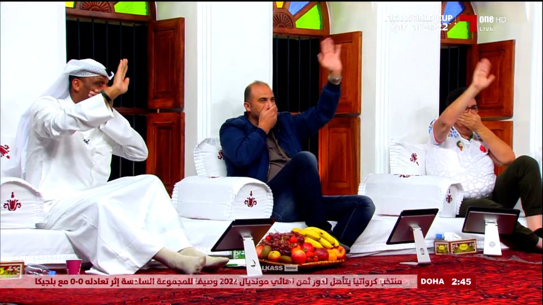 Football pundits on Qatar's Alkass Sports channel appear to mimic the German players' protest gesture.