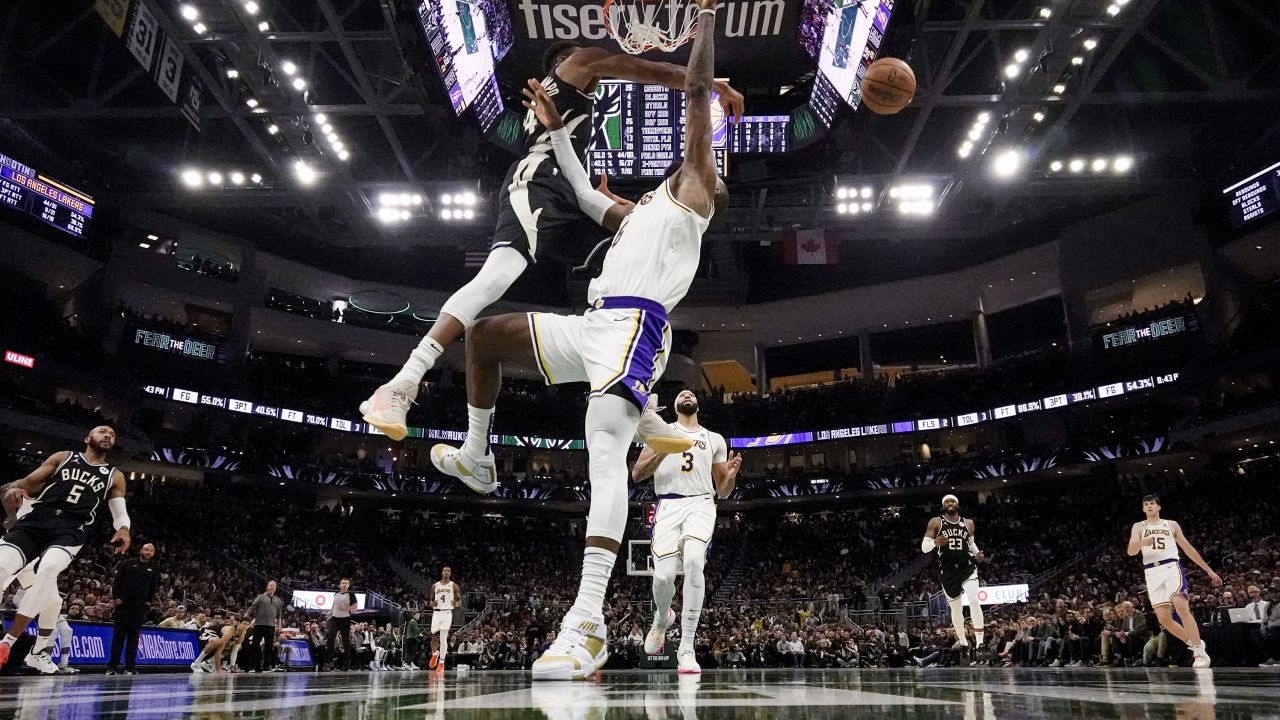 James, pictured as Milwaukee Bucks' Giannis Antetokounmpo blocks his shot, is creeping closer to the title of NBA all-time leading scorer.