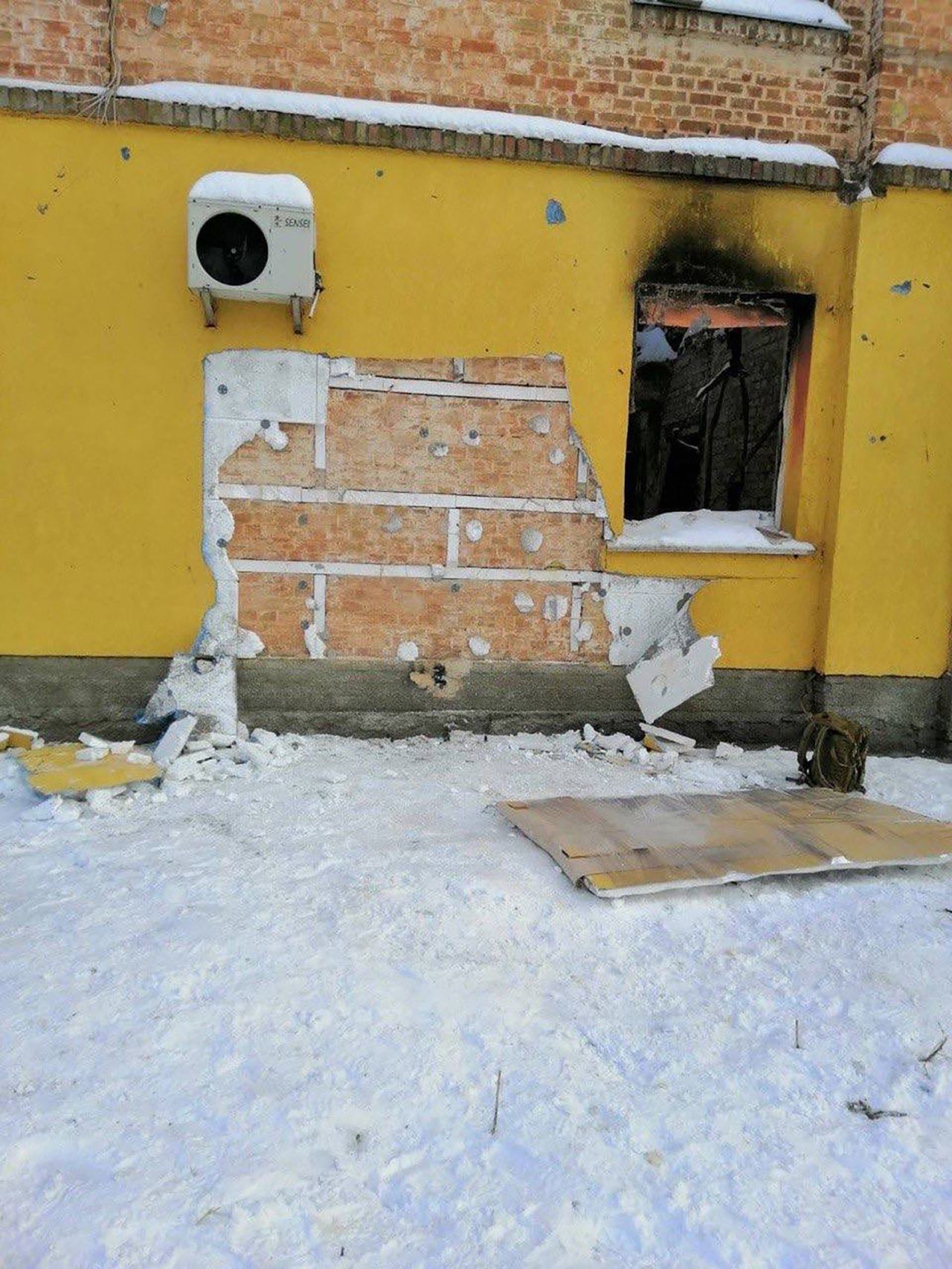 The group successfully removed the mural from the wall before being detained.