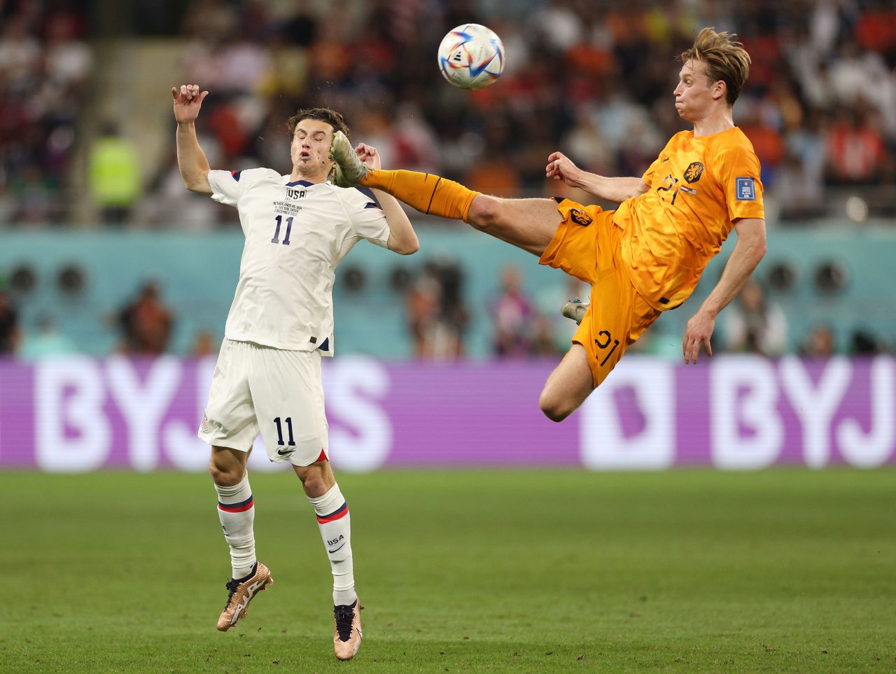 The United States' Brenden Aaronson, left, and the Netherlands' Frenkie de Jong battle for the ball on Saturday.