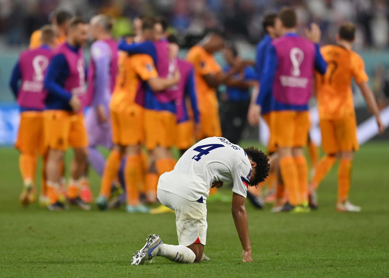 US captain Tyler Adams sinks to the ground after the Americans lost 3-1 to the Netherlands on December 3.