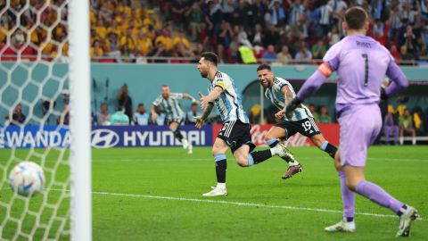 Lionel Messi scores in 1000th career game as Argentina reaches World Cup quarterfinals 2 Messi celebrates after he scores against Australia.