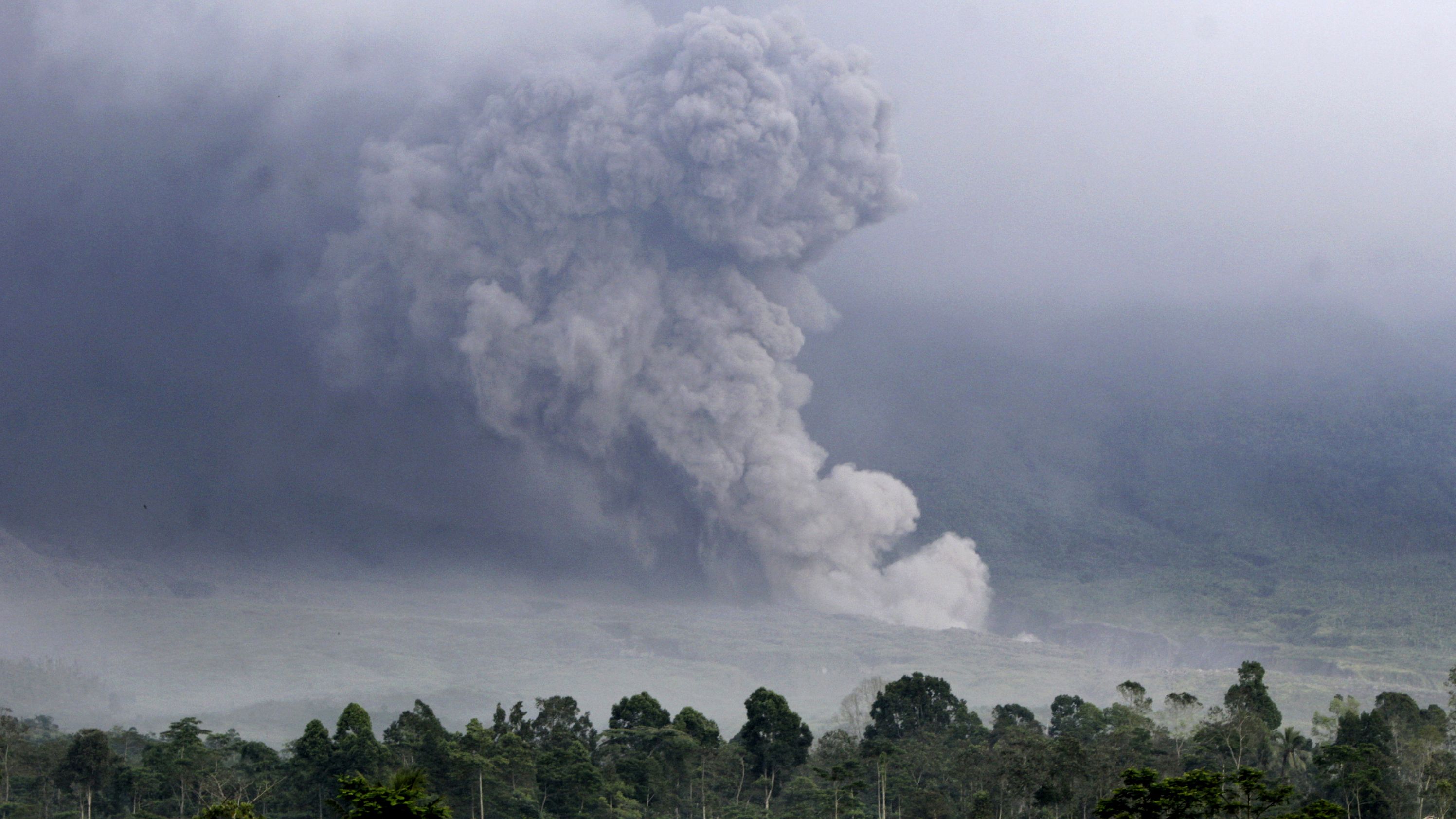Pyroclastic flow rolls down the slope of Mount Semeru during an eruption in Lumajang, East Java.