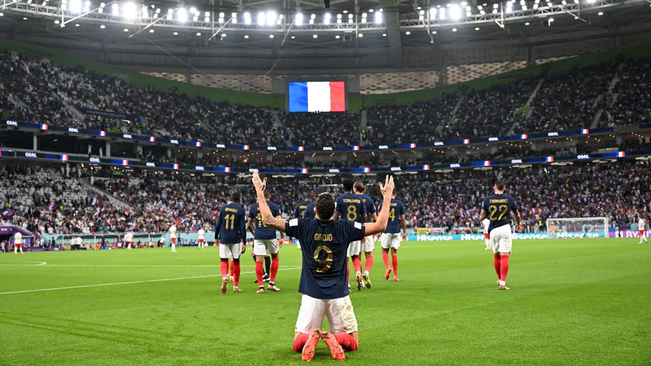 France's Olivier Giroud celebrates scoring his team's first goal against Poland on December 4. With the goal, Giroud became <em>Les Bleus</em>' all-time top goalscorer. France defeated Poland 3-1 to advance to the quarterfinals.