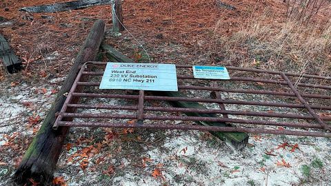 Damage to the gate to the Duke Energy West End substation is seen Sunday in Moore County.