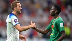 AL KHOR, QATAR - DECEMBER 04: Harry Kane of England shakes hands with Pape Matar Sarr of Senegal during the FIFA World Cup Qatar 2022 Round of 16 match between England and Senegal at Al Bayt Stadium on December 04, 2022 in Al Khor, Qatar. (Photo by Dan Mullan/Getty Images)