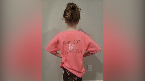 Serina Young models the shirt her grandmother made for her.