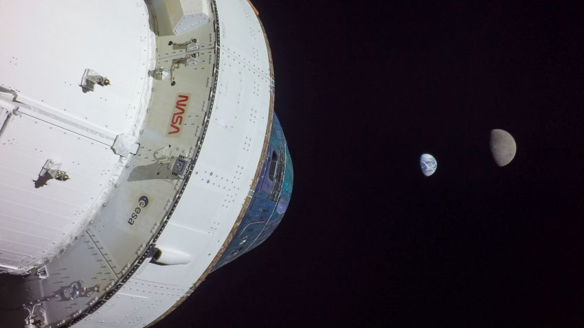 NASA's uncrewed Orion spacecraft reached a maximum distance of nearly 270,000 miles from Earth during the Artemis I flight test before beginning its journey back toward Earth. Orion captured imagery of the Earth and Moon together from its distant lunar orbit, including this image on Nov. 28, 2022, taken from camera on one of the spacecraft's solar array wings.