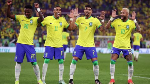 Neymar, Raphinha, Lucas Paqueta and Vinicius Junior celebrate after scoring Brazil's second goal.