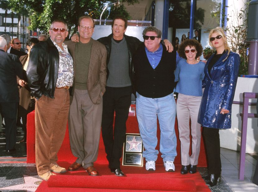 Alley, right, joins her fellow "Cheers" cast mates John Ratzenberger, Kelsey Grammer, Ted Danson, George Wendt and Rhea Perlman to celebrate Danson's induction into the Hollywood Walk of Fame in 1999.  