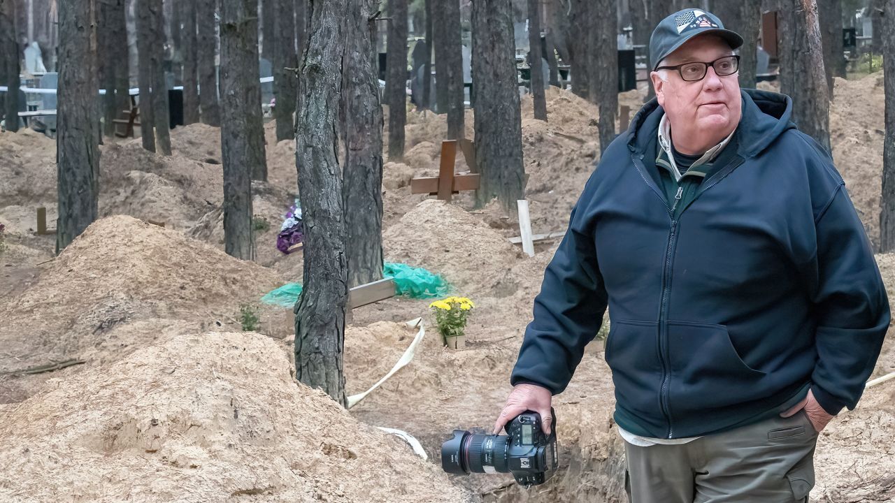 Howard G. Buffett visits a mass grave site on the outskirts of Izium on November 6, 2022.