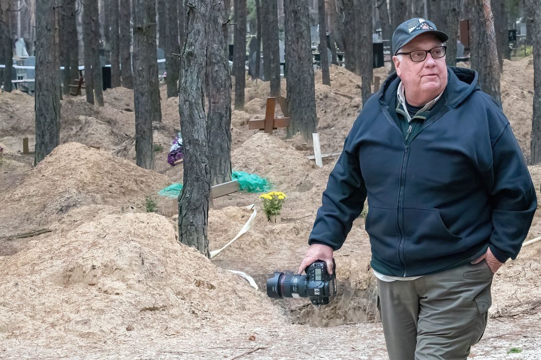 Howard G. Buffett visits a mass grave site on the outskirts of Izium on November 6, 2022. 