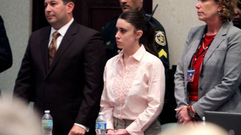 Casey Anthony is shown with his attorneys Jose Baez (left) and Dorothy Clay Sims (right) before the jury presents a verdict July 5, 2011 in Orlando.