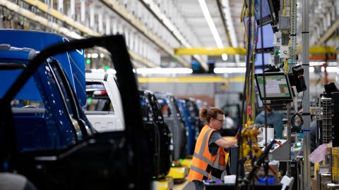 A worker on the Ford F-150 Lightning production line at the Ford Motor Co. Rouge Electric Vehicle Center in Dearborn, Michigan, US on Sept. 8, 2022. Photo by Emily Elconin/Bloomberg via Getty Images