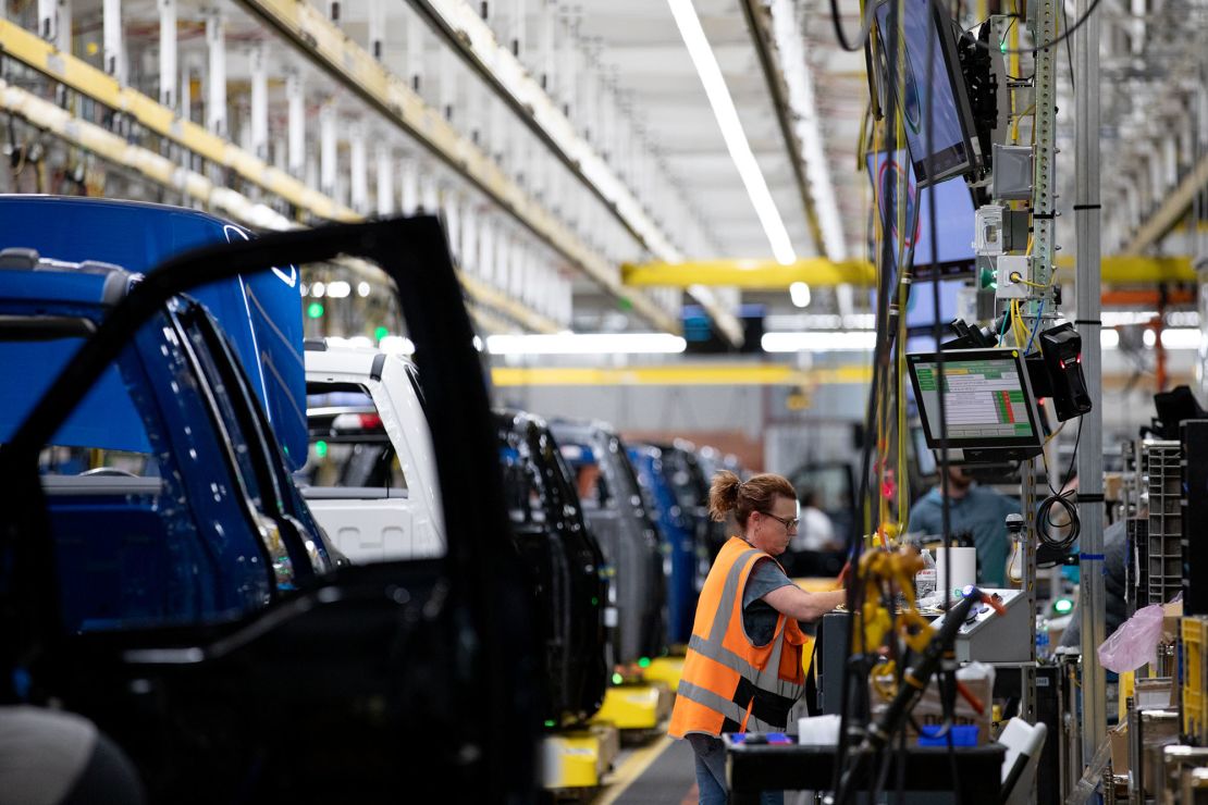 A worker on the Ford F-150 Lightning production line at the Ford Motor Co. Rouge Electric Vehicle Center in Dearborn, Michigan, US on Sept. 8, 2022. Photo by Emily Elconin/Bloomberg via Getty Images