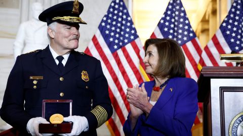 U.S. Capitol Police Chief Thomas Manger receives a medal from House Speaker Nancy Pelosi during a Congressional Gold Medal Ceremony.