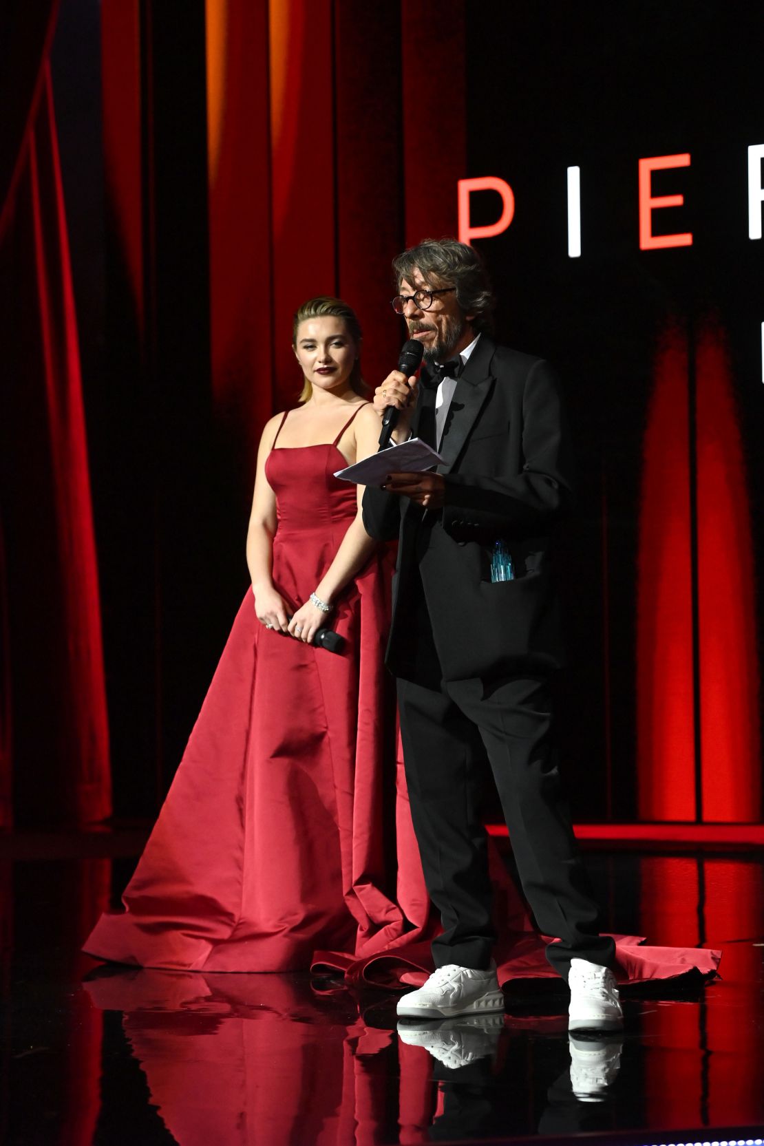 Florence Pugh presented the Designer of the Year award to Pierpaolo Piccioli for Valentino.