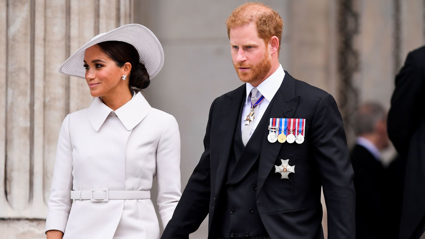 Prince Harry and Meghan, Duchess of Sussex, leave after attending the National Service of Thanksgiving at St Paul's Cathedral in London on June 3, 2022.