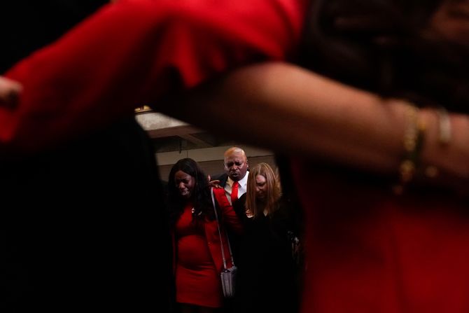 Walker supporters pray at his election night party in Atlanta.