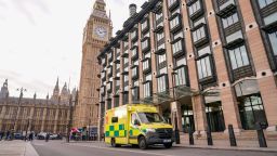 An ambulance is parked outside Portcullis House, backdropped by the Elizabeth Tower, commonly known as Big Ben, in London, Thursday, Dec. 1, 2022. Some 10000 ambulance staff have voted to strike over pay and working conditions, along with a possible 100,000 nurses going on strike on Dec1. 5, leading the Government to set up contingency plans to cope with a wave of walkouts with Cabinet Minister Oliver Dowden in charge.