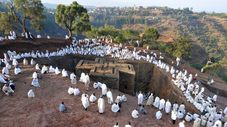 <strong>Ethiopia: </strong>Ethiopia's northern town of Lalibela is known for its <a href="https://cnn.com/travel/article/lalibela-ethiopia-genna-tariq-zaidi/index.html" target="_blank">ancient rock-hewn churches</a>. Pilgrims are seen here gathering at the Church of Saint George. 