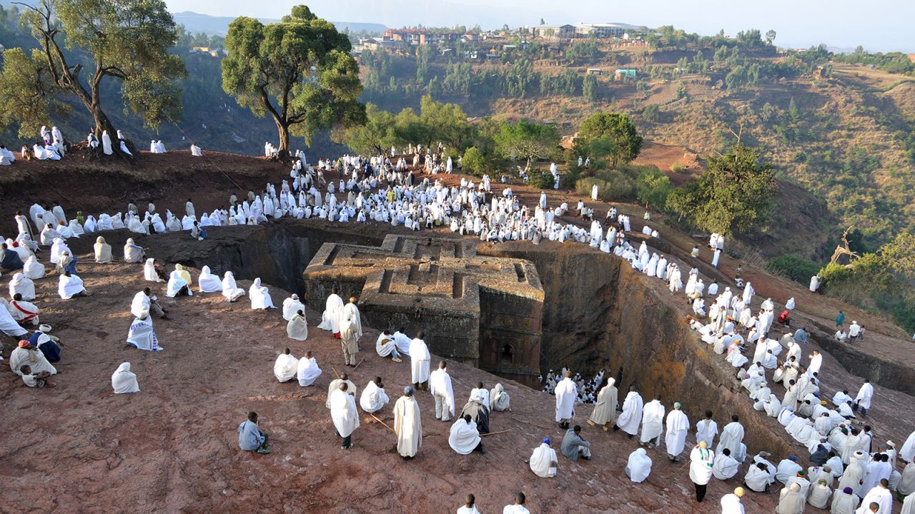<strong>Ethiopia: </strong>Ethiopia's northern town of Lalibela is known for its <a href="https://cnn.com/travel/article/lalibela-ethiopia-genna-tariq-zaidi/index.html" target="_blank">ancient rock-hewn churches</a>. Pilgrims are seen here gathering at the Church of Saint George. 