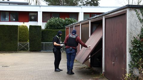 Police secure an area in Berlin, Germany on Wednesday after arresting supporters of a far-right terrorist organization.