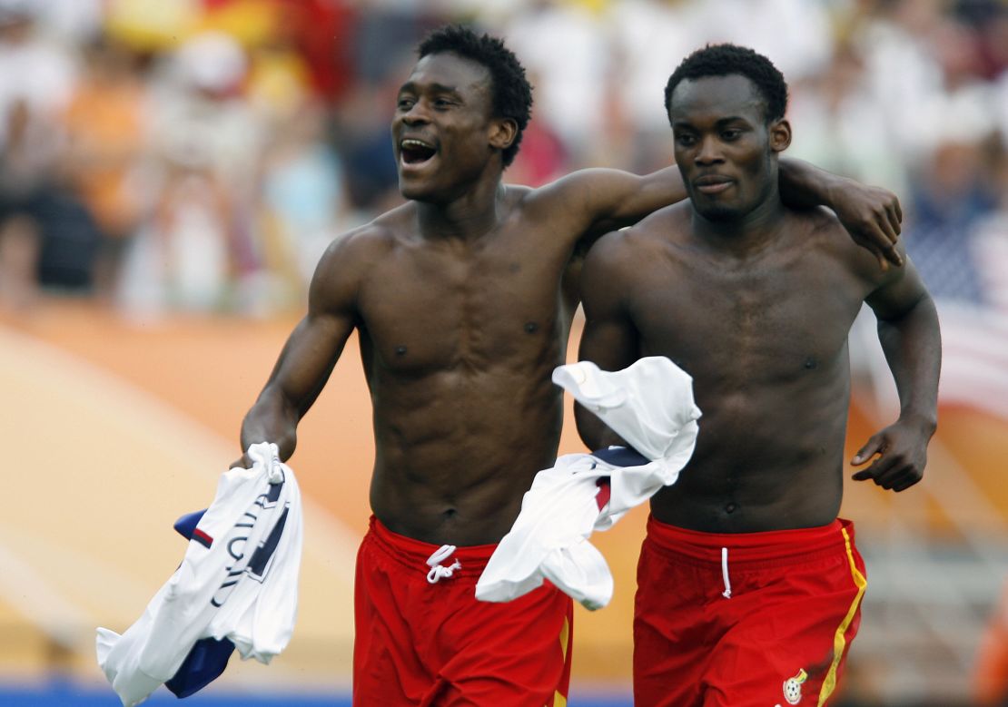 Boateng celebrates Ghana's victory over the United States at the 2006 World Cup alongside star midfielder Michael Essien.