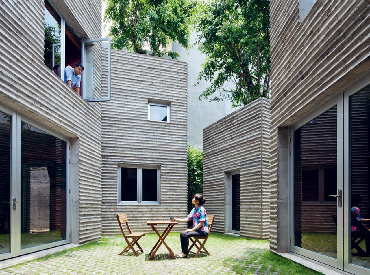 <strong>House for Trees, Ho Chi Minh, Vietnam, Vo Trong Nghia Architects (2014) --</strong> Designed to fit into the dense urban living of Vietnam's largest city, these homes have turned their deep flat roofs into giant containers for flora. "I just love this idea of having a house that is essentially like a massive plant pot," says Topham. Their composition creates internal courtyards, while the green roofs acts as a filter for the city's aerial pollutants. "The planting has to come first," he adds, "rather than doing it as an afterthought."