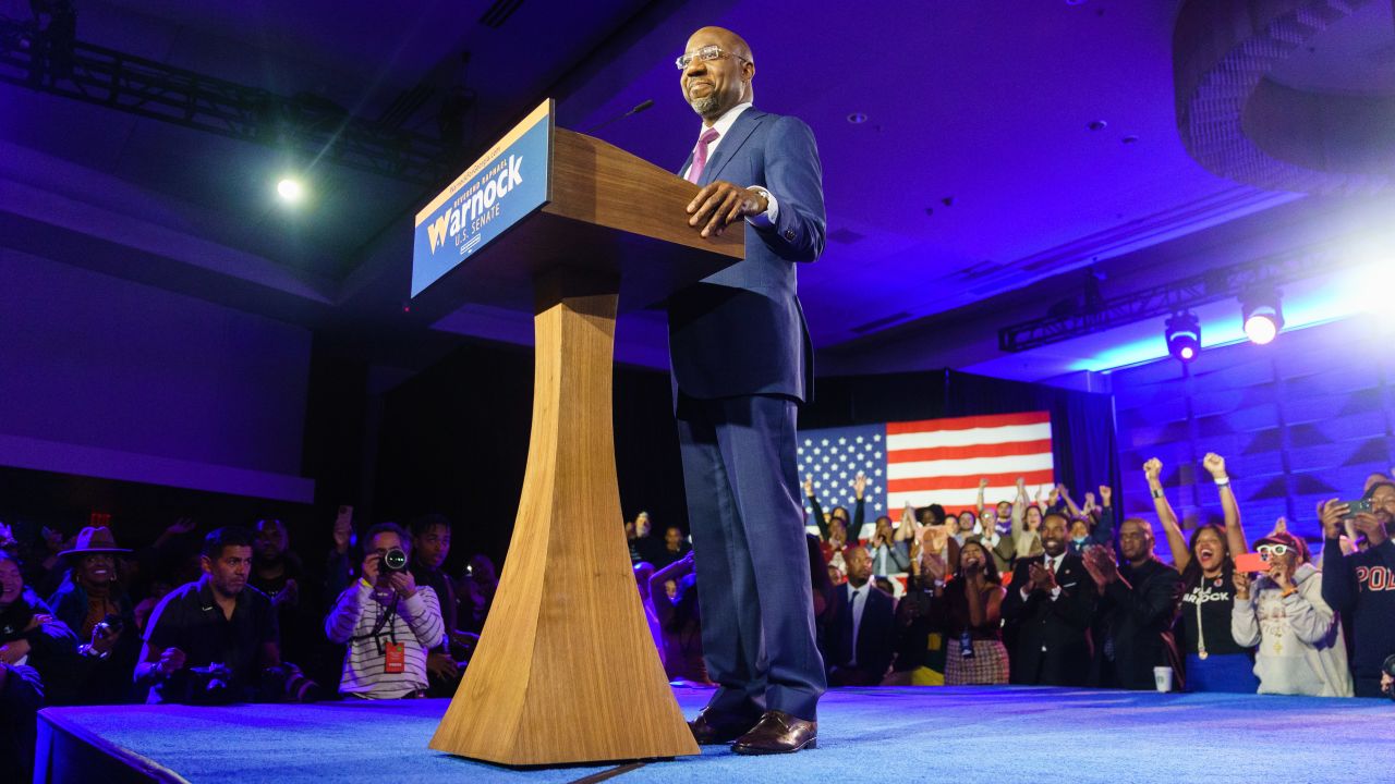 Senator Raphael Warnock, a Democrat from Georgia, speaks during a runoff election night event in Atlanta, Georgia, US, on Tuesday, Dec. 6, 2022. Warnock defeated GOP challenger and former football star Herschel Walker late Tuesday, giving Democrats a crucial 51-49 majority and a cushion on close votes where senators like Joe Manchin of West Virginia might break party ranks. Photographer: Elijah Nouvelage/Bloomberg via Getty Images