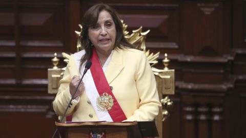 Former Vice President Dina Boluarte addresses lawmakers after being sworn-in as the new president at Congress in Lima, Peru, Wednesday, Dec. 7, 2022.