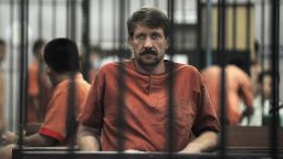 Alleged Russian arms dealer Viktor Bout sits in a temporary cell ahead of a hearing at the Criminal Court in Bangkok on August 20, 2010.  A Thai appeals court granted a request by the United States for the extradition of Viktor Bout, an alleged Russian arms dealer dubbed the "Merchant of Death".    THAILAND OUT   AFP PHOTO/Christophe ARCHAMBAULT (Photo credit should read CHRISTOPHE ARCHAMBAULT/AFP via Getty Images)