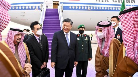 President of the People's Republic of China Xi Jinping (C) is welcomed by Emir of Riyadh Faisal bin Bende bin Abdulaziz (L) and Saudi Arabian Foreign Minister Faisal bin Farhan (R) at King Khalid International Airport in Riyadh, Saudi Arabia on December 7, 2022.