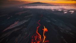 HILO, HI - DECEMBER 7: In an aerial view, lava fissures flow downslope from the north flank of Mauna Loa Volcano on December 7, 2022 in Hilo, Hawaii. For the first time in almost 40 years, the biggest active volcano in the world erupted prompting an emergency response on the Big Island. (Photo by Andrew Richard Hara/Getty Images)